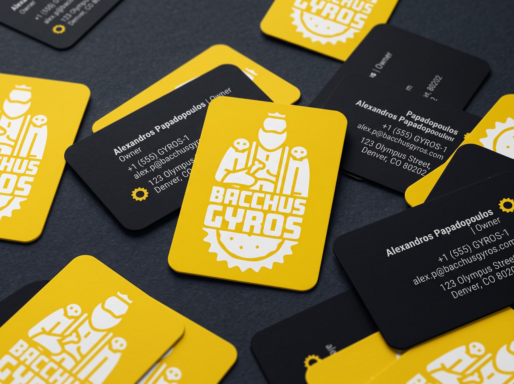 Cartes de visite jaunes et noires au logo Bacchus Gyros
