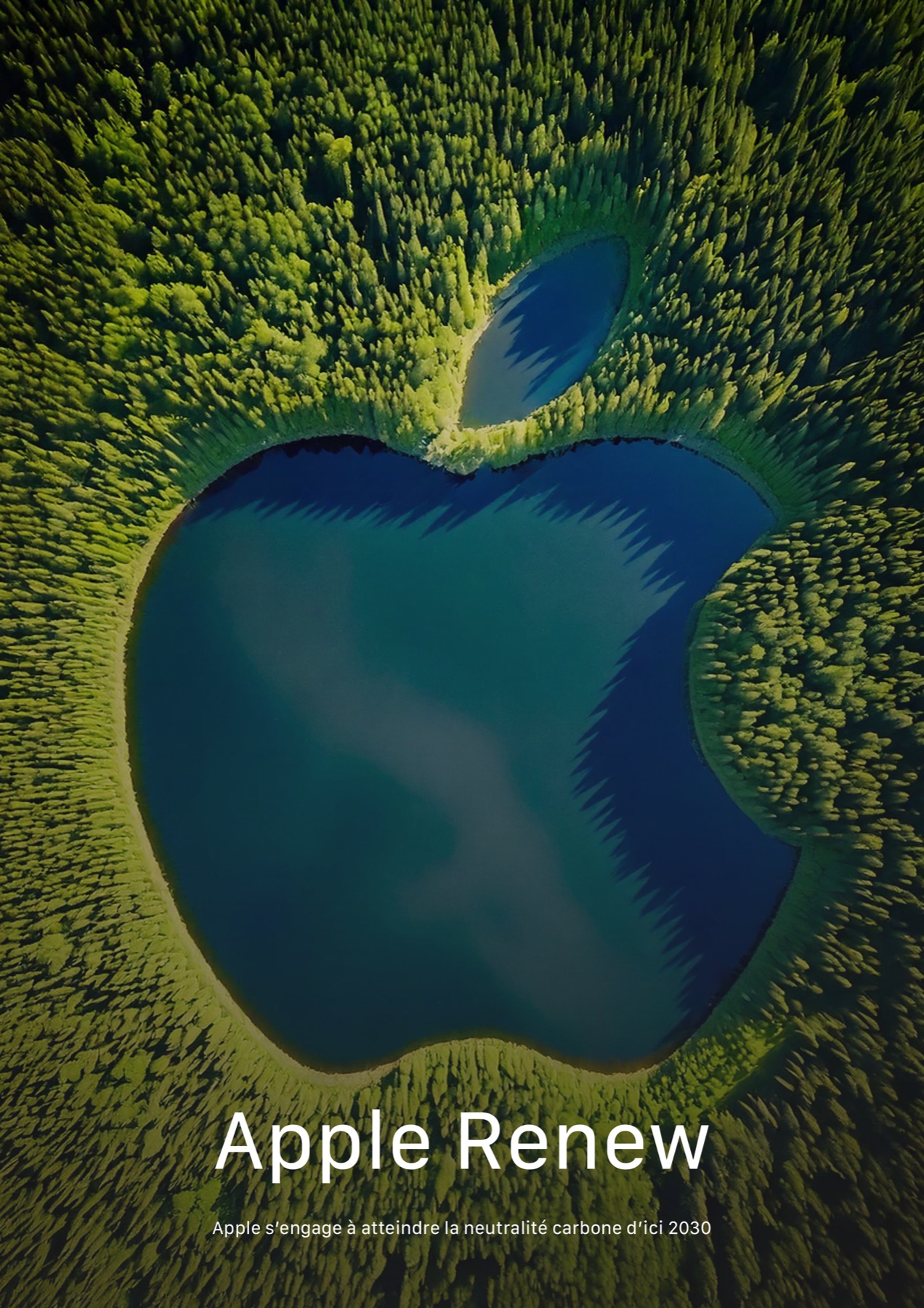 Apple Renew : un lac en forme de pomme au milieu d'une forêt vue du ciel